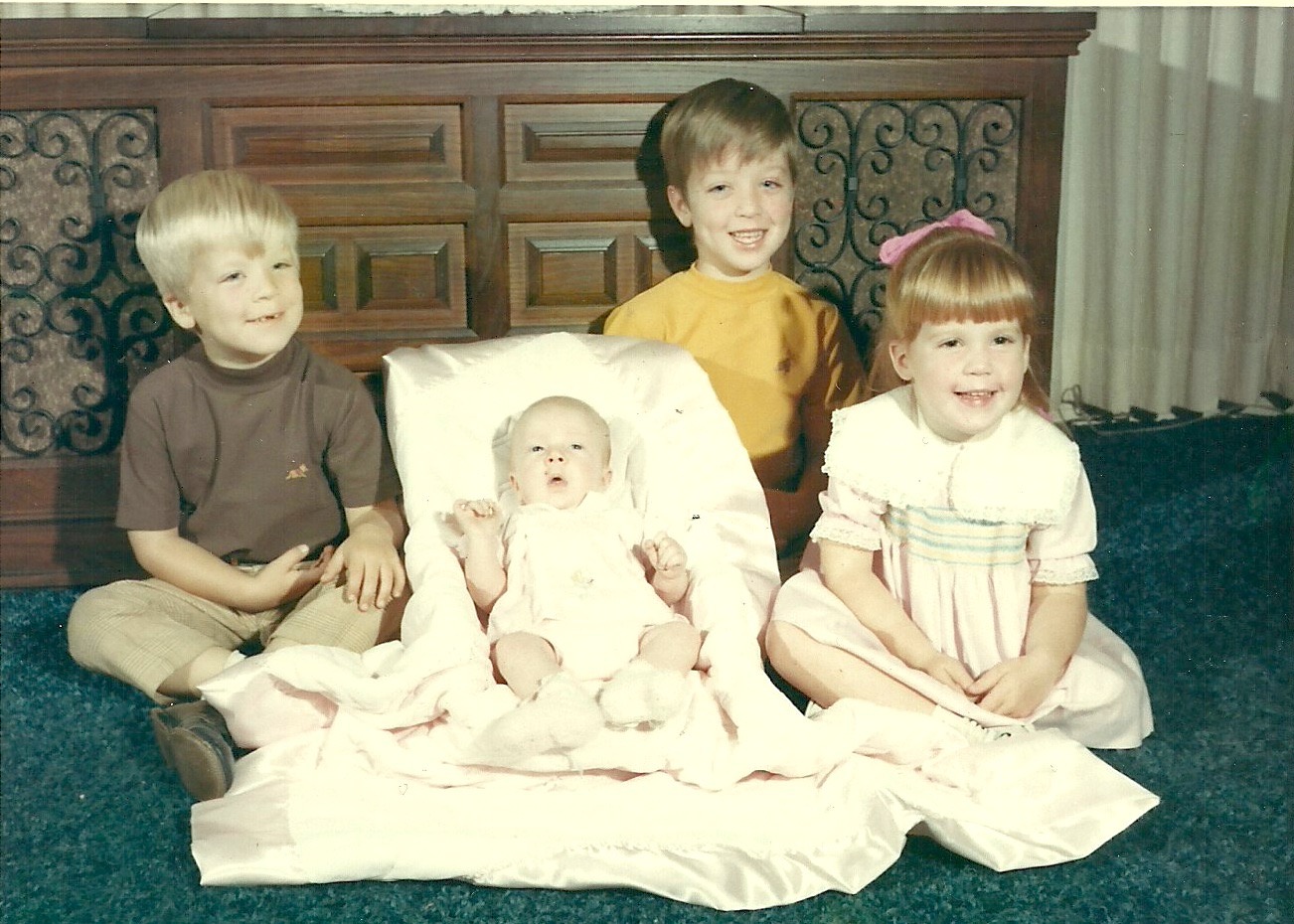 Coach Manning with his siblings